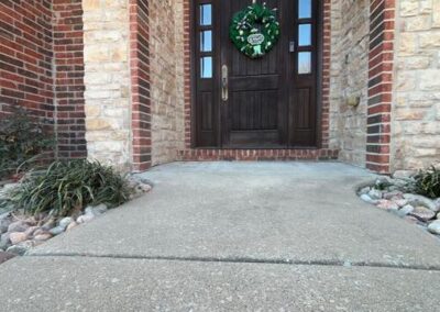 Lifting and Stabilizing concrete porch in Rogers, AR.